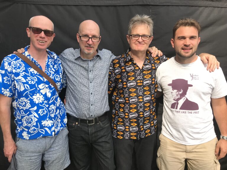 Atlanticus band all in a line looking at the camera